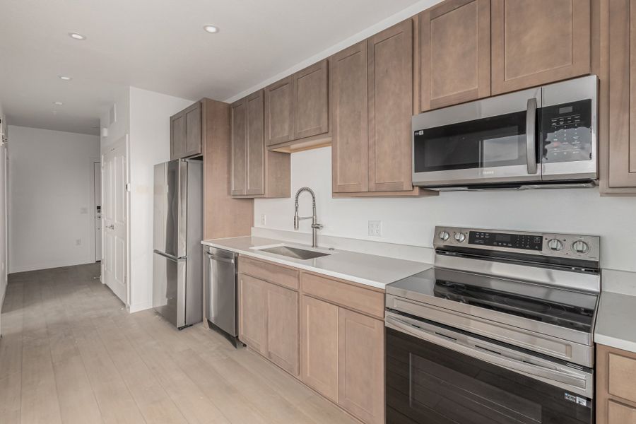 Furnished interior in a model home at The Scene at Sloan's Lake in Denver (Image 20).