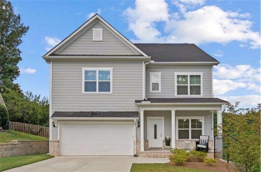 Front exterior of a new home in , Villa Rica, GA, highlighting curb appeal (Image 25).