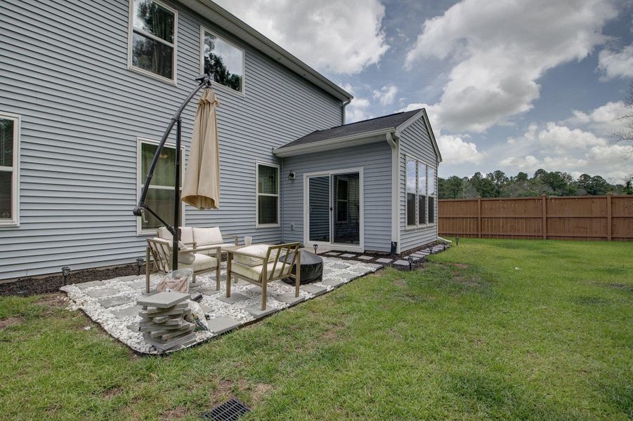 Exterior details and patio area of a home in Oakley Pointe, Moncks Corner (Image 33). Exterior details and patio area of a home in Oakley Pointe, Moncks Corner (Image 33).