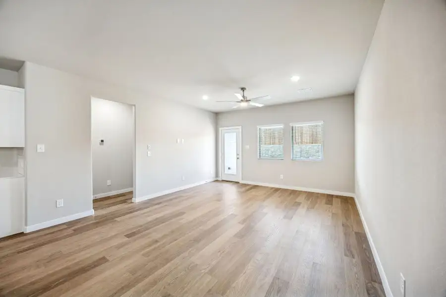 Living and Dining Room in the Willow home plan by Trophy Signature Homes – REPRESENTATIVE PHOTO Living and Dining Room in the Willow home plan by Trophy Signature Homes – REPRESENTATIVE PHOTO