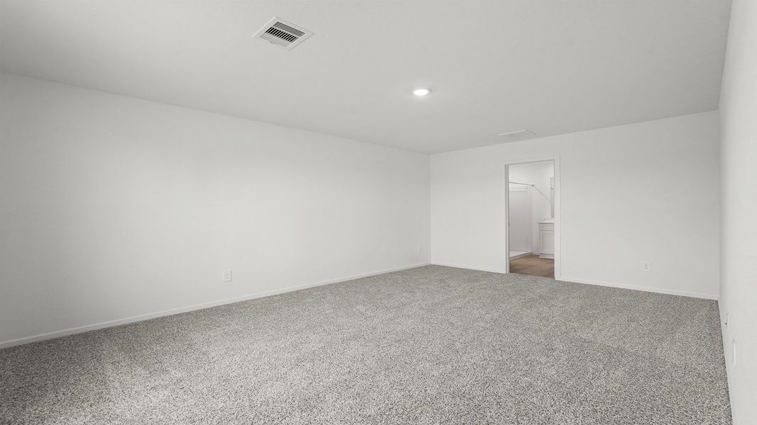 Spacious, unfurnished interior of a new home in Sunterra, Katy (Image 21).
