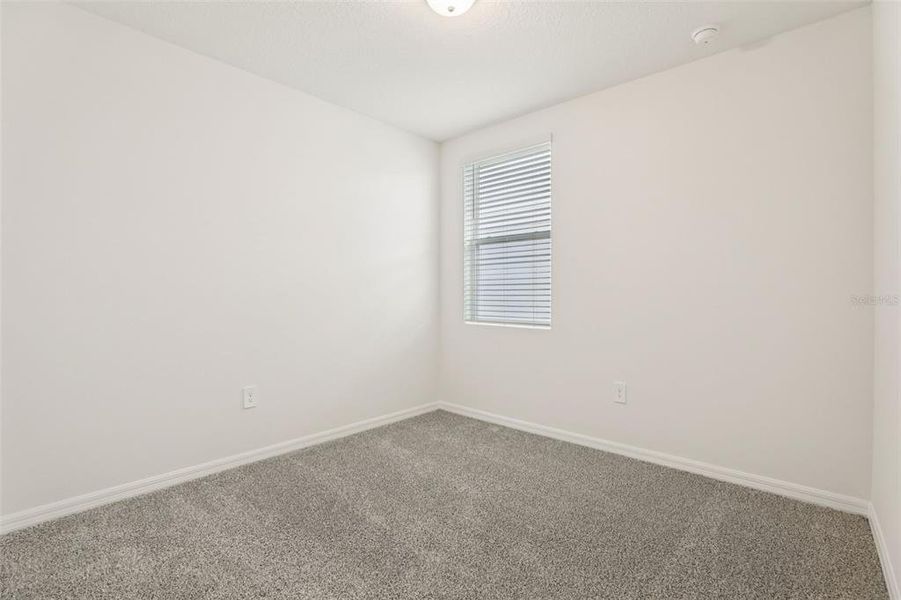 Spacious, unfurnished interior of a new home in Lawson Dunes - Signature Series, Haines City (Image 29).