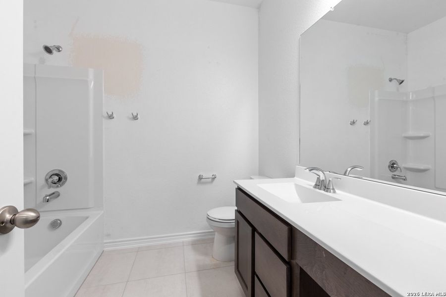 Furnished interior view inside a new home in Hidden Bluffs at TRP, San Antonio (Image 9).