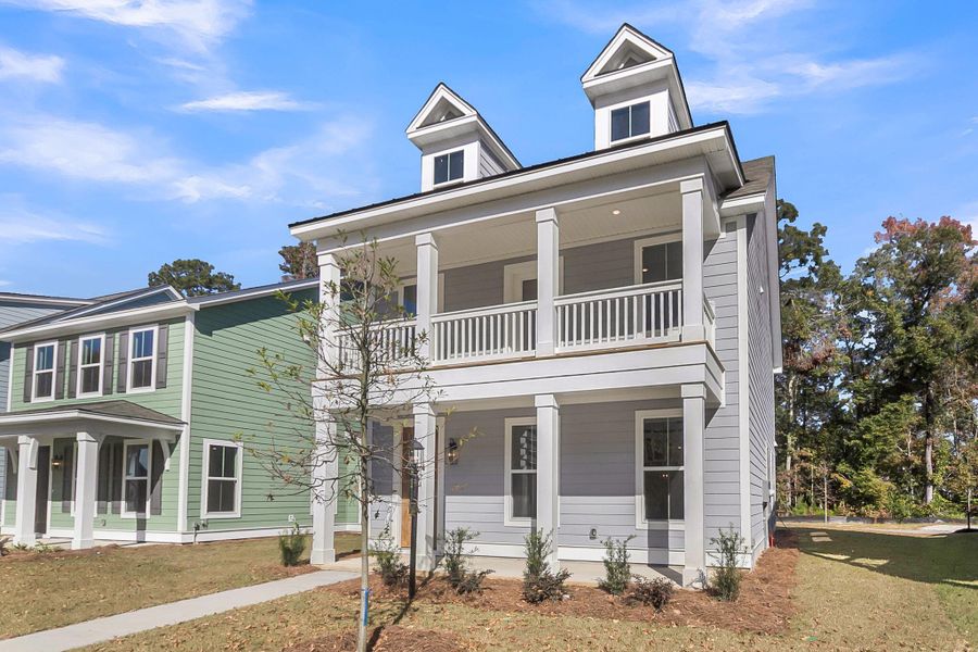 Front exterior of a new home in Sweetgrass Station, Summerville, SC, highlighting curb appeal (Image 25).