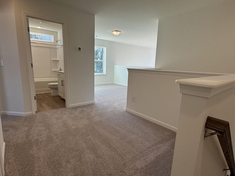 Spacious, unfurnished interior of a new home in East Main Townes, Spartanburg (Image 16).