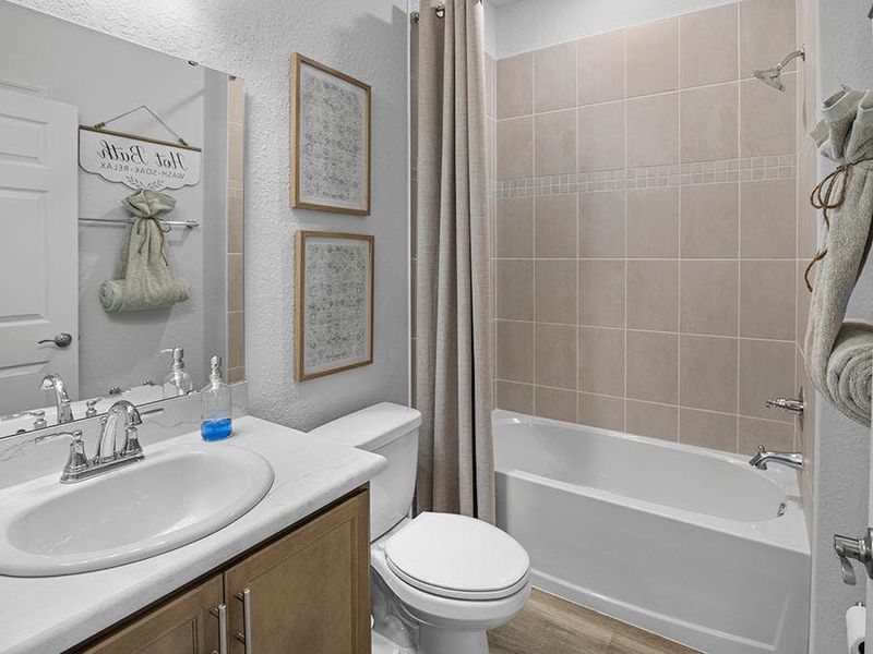 Secondary bedrooms share a hall bath - Summerlyn II by Highland Homes