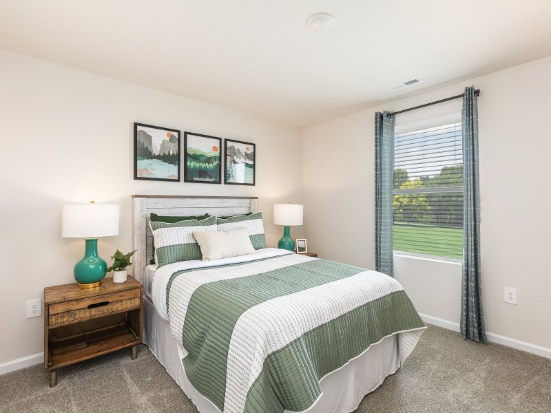 Secondary bedroom in the Chatham floorplan at a Meritage Homes community in Angier, NC.