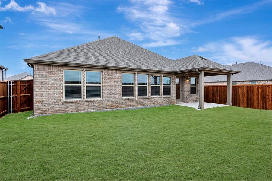 Exterior details and patio area of a home in The Preserve, Justin (Image 25). Exterior details and patio area of a home in The Preserve, Justin (Image 25).