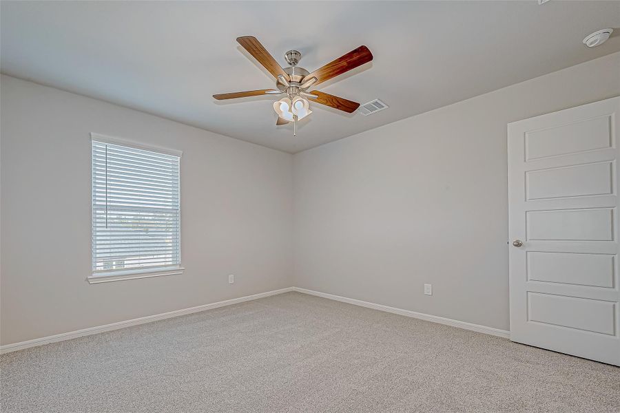 Spacious, unfurnished interior of a new home in Mill Creek Trails, Magnolia (Image 19).