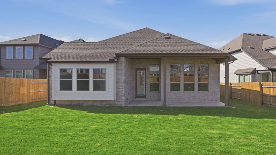 Exterior details and patio area of a home in Oaks at San Gabriel, Georgetown (Image 4).