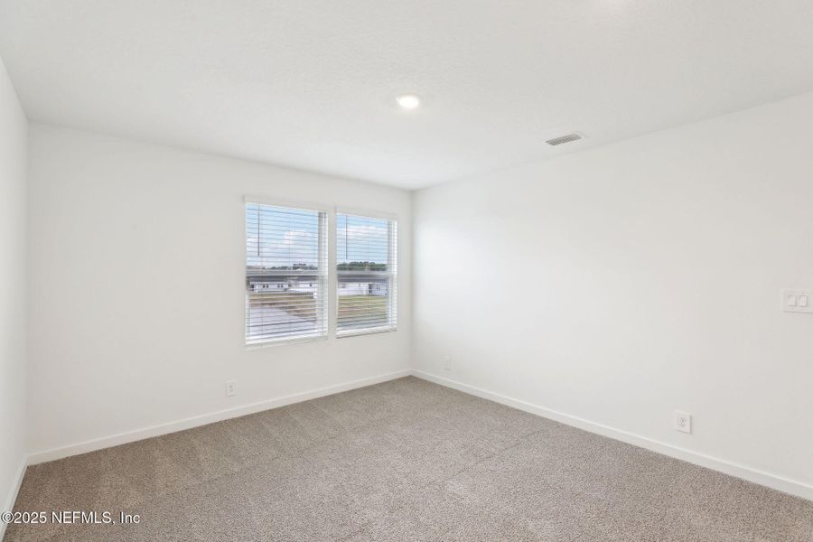 Spacious, unfurnished interior of a new home in Lakes at Bella Lago - Signature Series, Green Cove Springs (Image 26). Spacious, unfurnished interior of a new home in Lakes at Bella Lago - Signature Series, Green Cove Springs (Image 26).