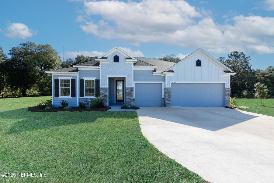 Front exterior of a new home in , Callahan, FL, highlighting curb appeal (Image 2). Front exterior of a new home in , Callahan, FL, highlighting curb appeal (Image 2).