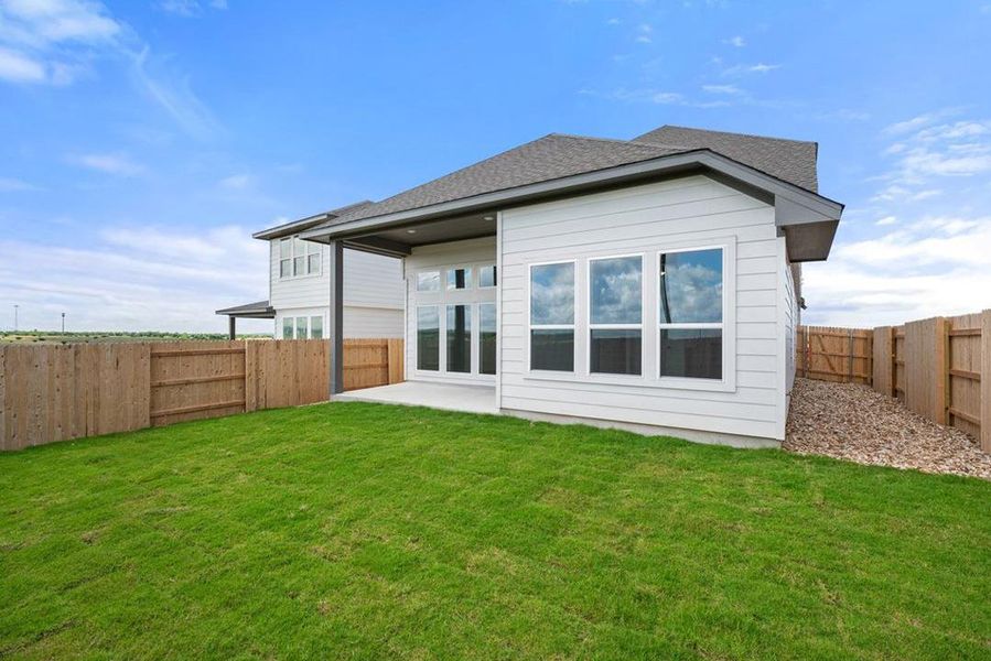 Exterior details and patio area of a home in Terrace Collection At Turner's Crossing, Buda (Image 2). Exterior details and patio area of a home in Terrace Collection At Turner's Crossing, Buda (Image 2).