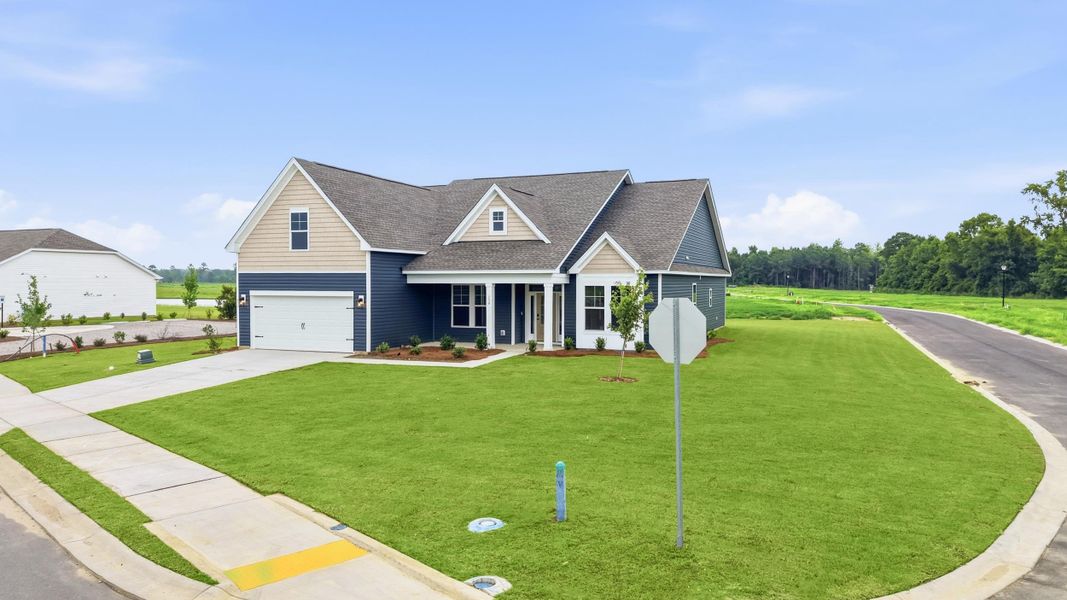Front exterior of a new home in Edgefield, Loris, SC, highlighting curb appeal (Image 20).
