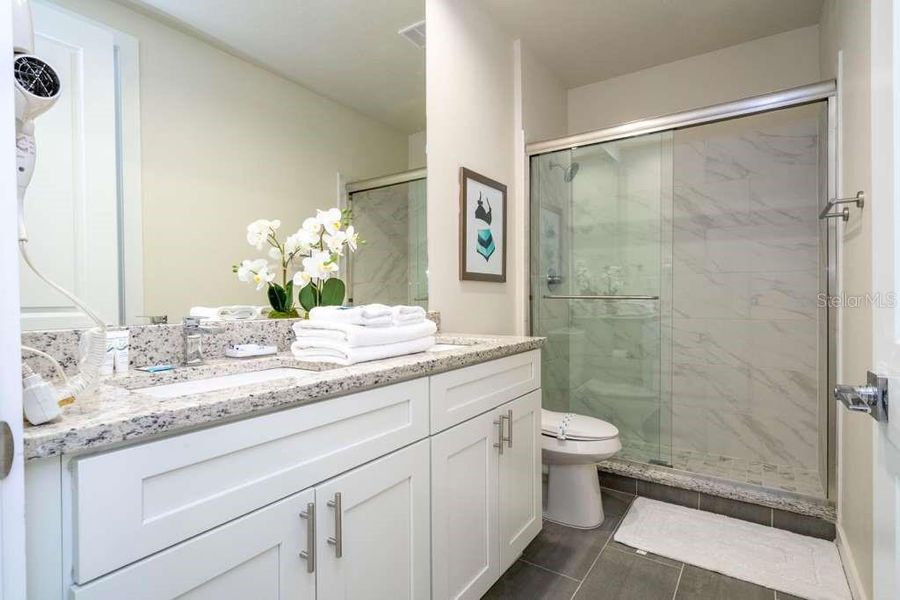 Furnished interior view inside a new home in , Kissimmee (Image 13).