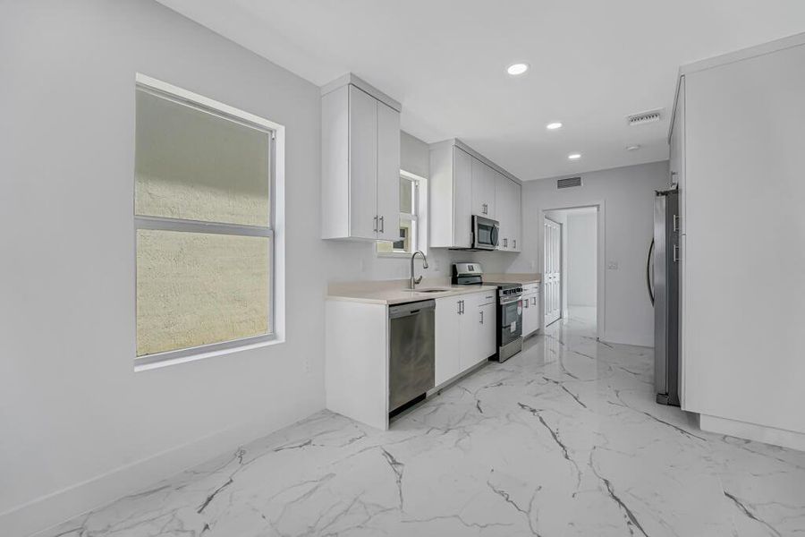 Furnished interior view inside a new home in , Boynton Beach (Image 4).