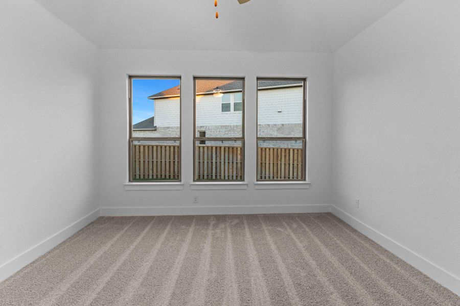 Primary Bedroom with elevated ceiling