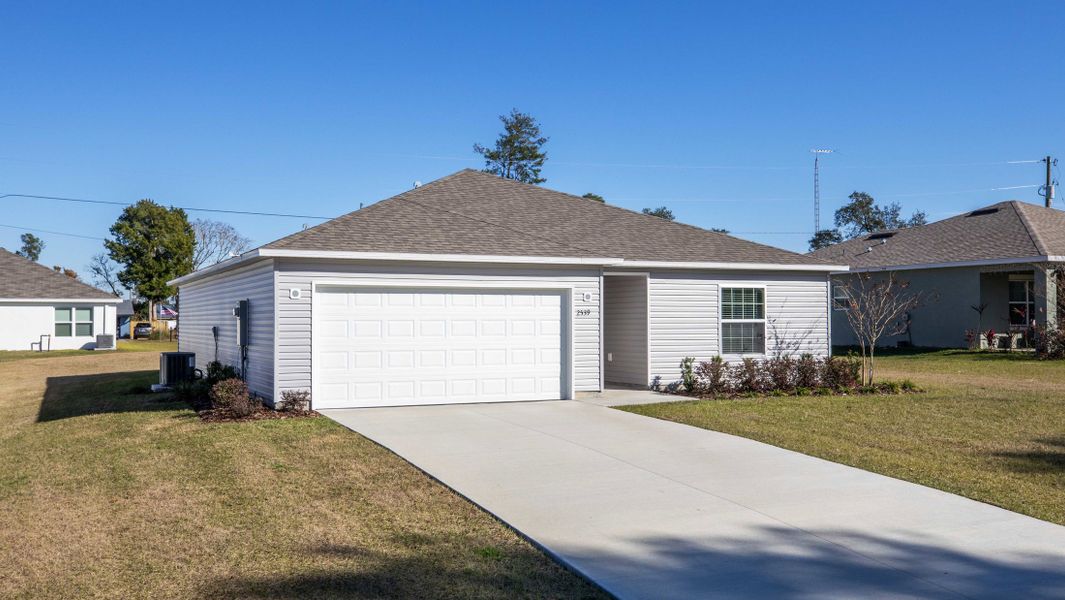 Representative exterior photo of a completed home built from the Violet by Maronda Homes in Vero Lake Estates, Sebastian, FL (Image 20). Representative exterior photo of a completed home built from the Violet by Maronda Homes in Vero Lake Estates, Sebastian, FL (Image 20).