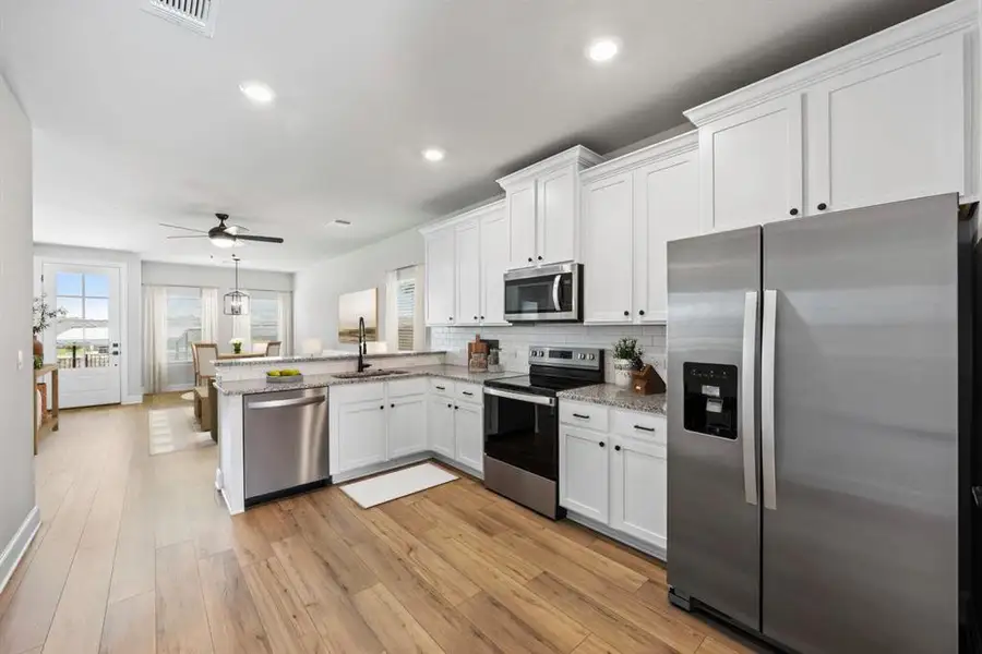 Spacious kitchen -digitially staged