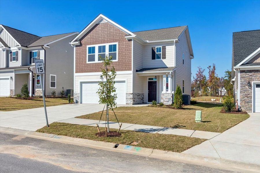 Front exterior of a new home in Tillery Park, Grovetown, GA, highlighting curb appeal (Image 20). Front exterior of a new home in Tillery Park, Grovetown, GA, highlighting curb appeal (Image 20).