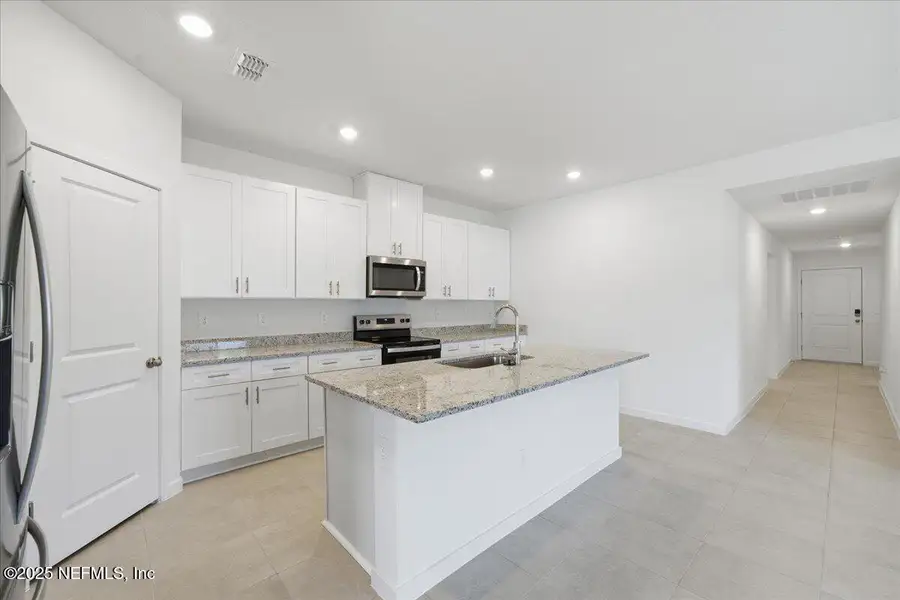 Furnished interior view inside a new home in Azalea Creek, Jacksonville (Image 7).