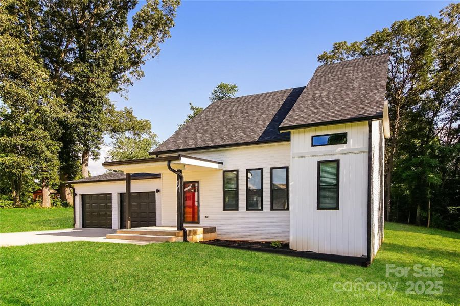 Front exterior of a new home in , Statesville, NC, highlighting curb appeal (Image 1). Front exterior of a new home in , Statesville, NC, highlighting curb appeal (Image 1).