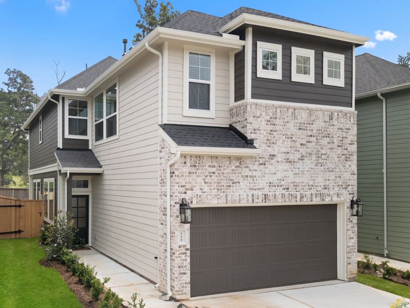 Front exterior of a new home in The Woodlands Hills, Willis, TX, highlighting curb appeal (Image 25). Front exterior of a new home in The Woodlands Hills, Willis, TX, highlighting curb appeal (Image 25).