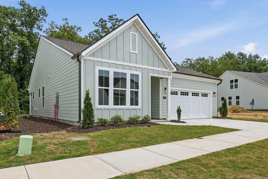 Front exterior of a new home in Social Circle, Chattanooga, TN, highlighting curb appeal (Image 16). Front exterior of a new home in Social Circle, Chattanooga, TN, highlighting curb appeal (Image 16).