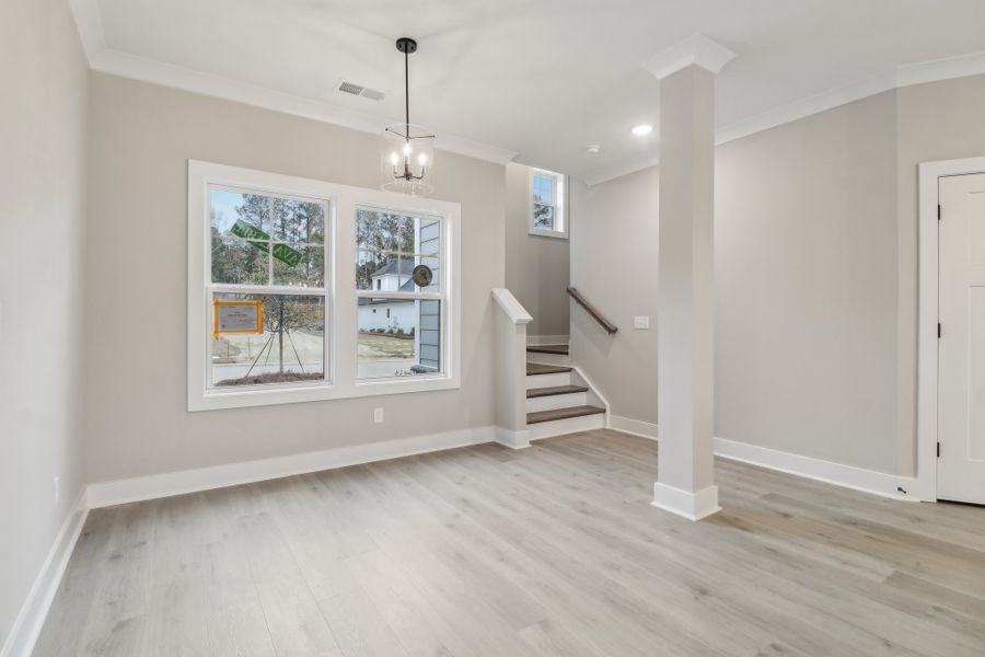 Representative unfurnished interior of a home built from the Ashbourne II by Great Southern Homes in Collins Cove, Chapin (Image 39).