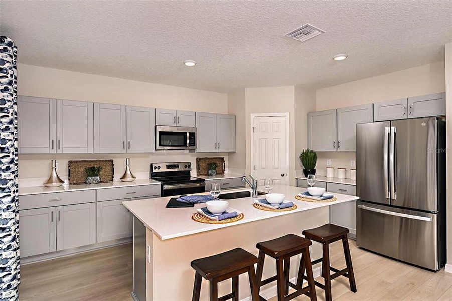 Furnished interior view inside a new home in Scenic Terrace, Haines City (Image 23).