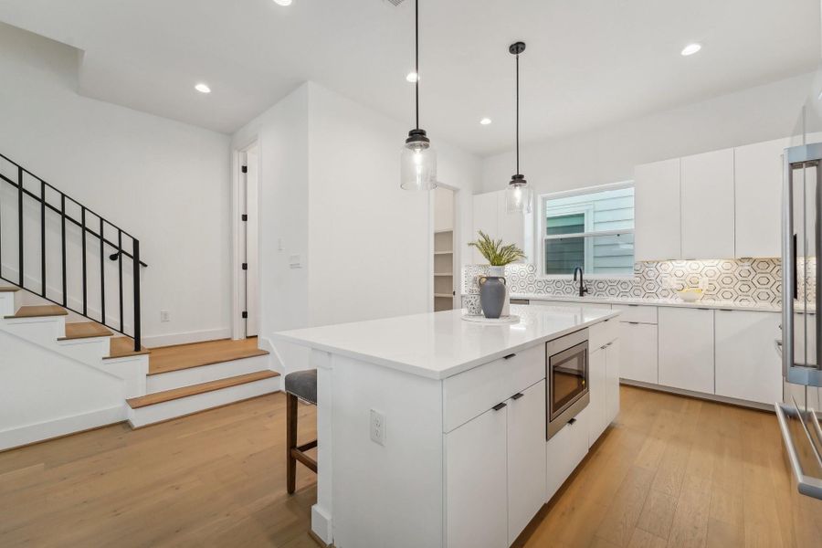 Photos show similar floor plan & alternative finishes from the previous development. Selections may vary.