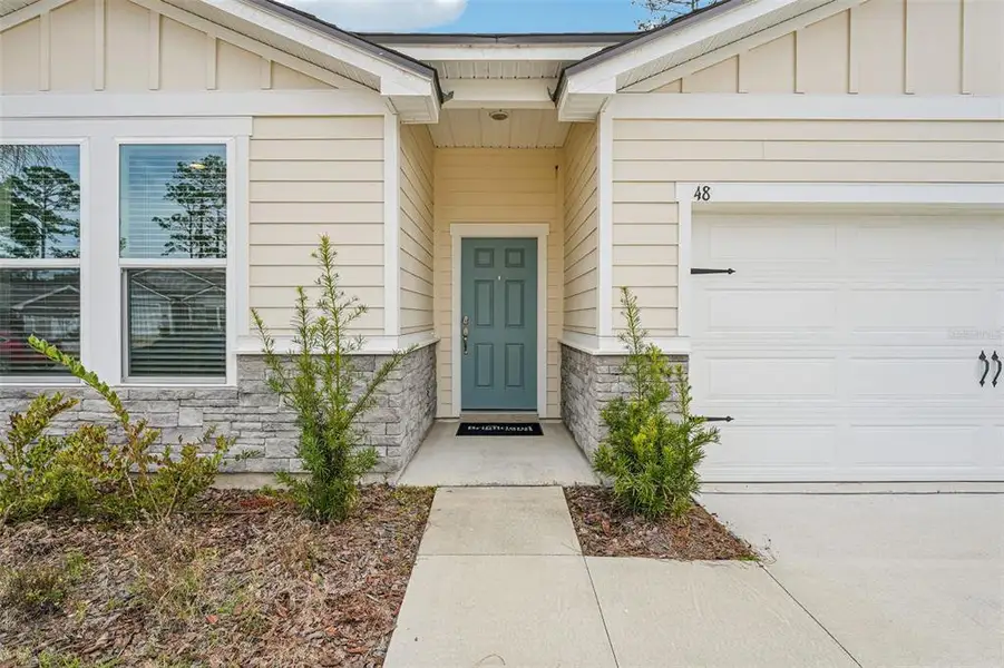 Exterior details and patio area of a home in , Palm Coast (Image 3). Exterior details and patio area of a home in , Palm Coast (Image 3).