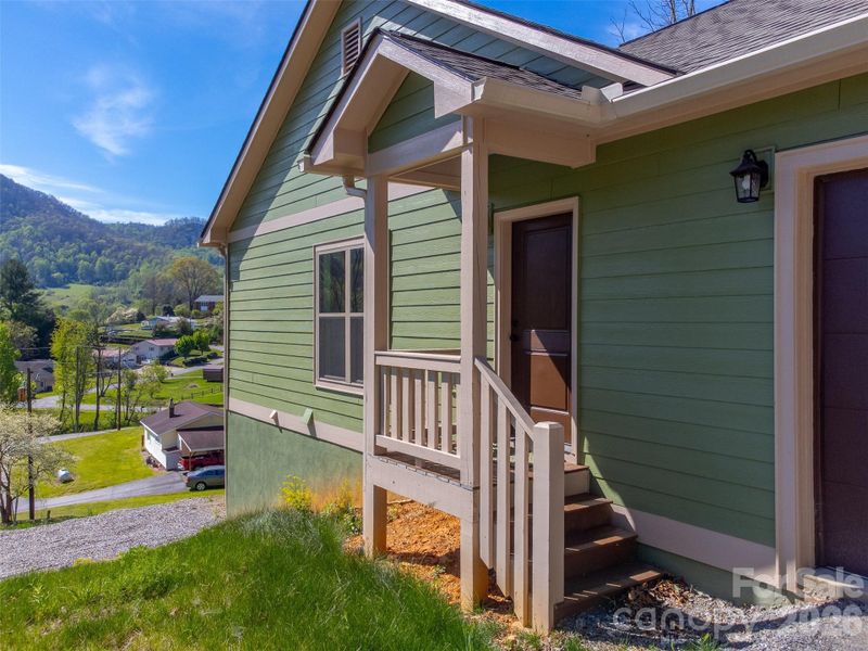 Exterior details and patio area of a home in , Waynesville (Image 26).