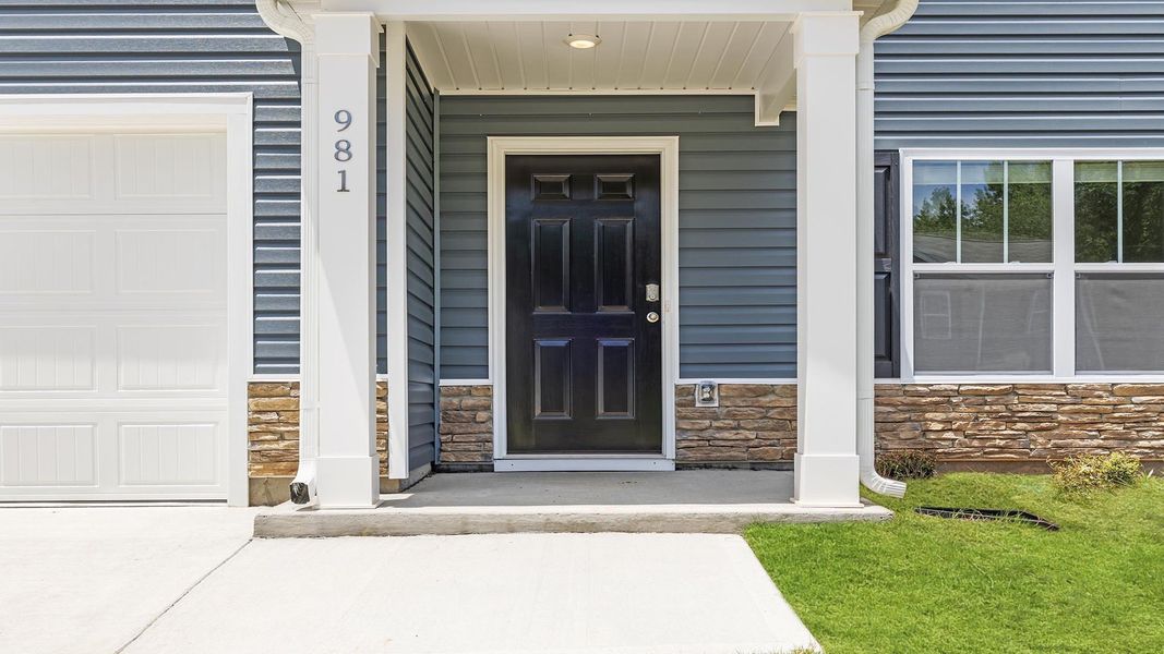 Exterior details and patio area of a home in Lightwood Cottages, Moore (Image 2).