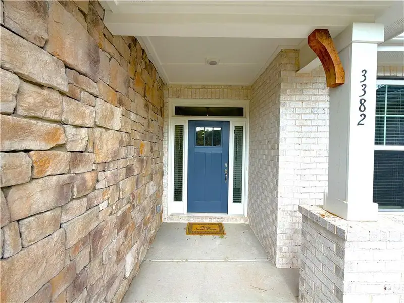 Exterior details and patio area of a home in Tuscany Hills, Douglasville (Image 3).