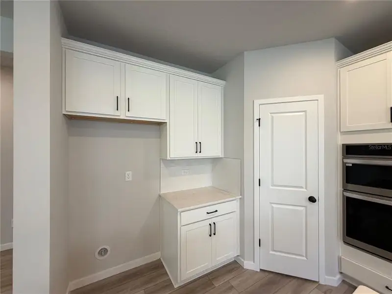 Furnished interior view inside a new home in Reserve East, Flagler Beach (Image 7).