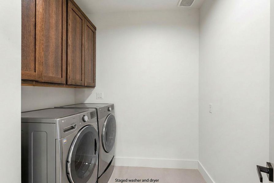 Generously sized laundry area.