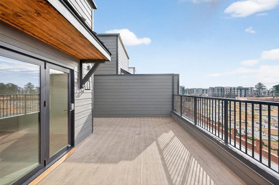 Exterior details and patio area of a home in Skyview On Broad, Sugar Hill (Image 3).