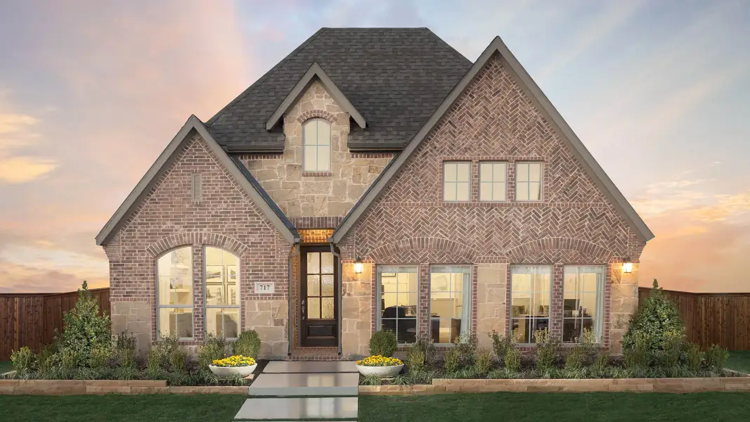 Front exterior of a new home in Devonshire, Forney, TX, highlighting curb appeal (Image 19). Front exterior of a new home in Devonshire, Forney, TX, highlighting curb appeal (Image 19).
