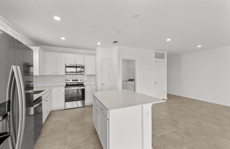 Furnished interior view inside a new home in Whispering Lakes, Lehigh Acres (Image 12).