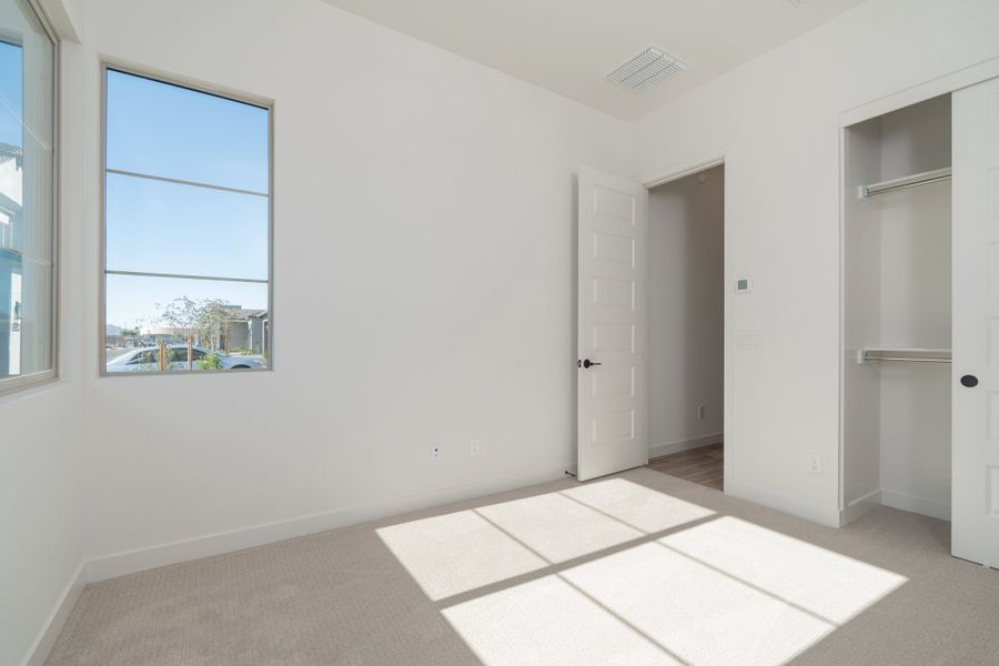 Spacious, unfurnished interior of a new home in Soleo, San Tan Valley (Image 14).