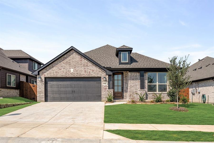 Front exterior of a new home in Country Lakes Classic 50, Denton, TX, highlighting curb appeal (Image 26).