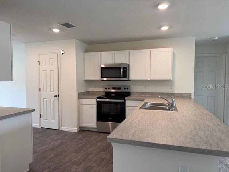 Furnished interior view inside a new home in Palm Coast: Value Collection, Palm Coast (Image 5).