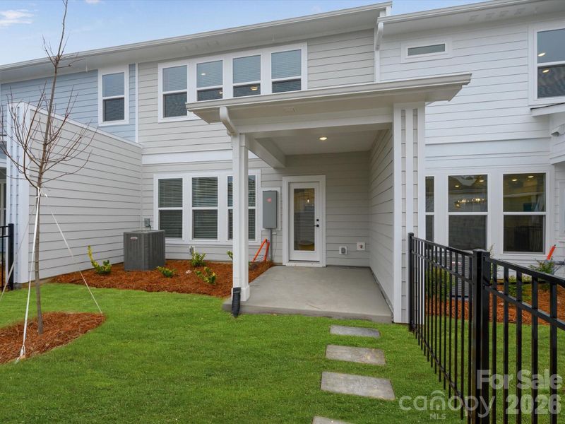 Exterior details and patio area of a home in North Creek Village, Huntersville (Image 19).
