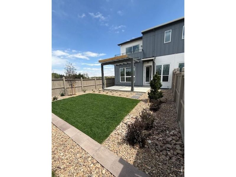 Exterior details and patio area of a home in West Grange, Longmont (Image 4).
