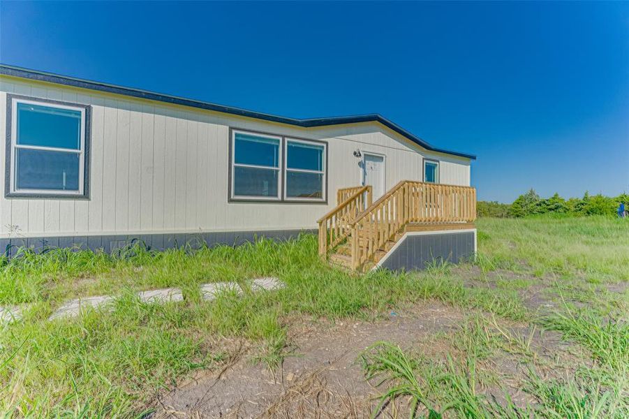 Exterior details and patio area of a home in , Ferris (Image 15). Exterior details and patio area of a home in , Ferris (Image 15).