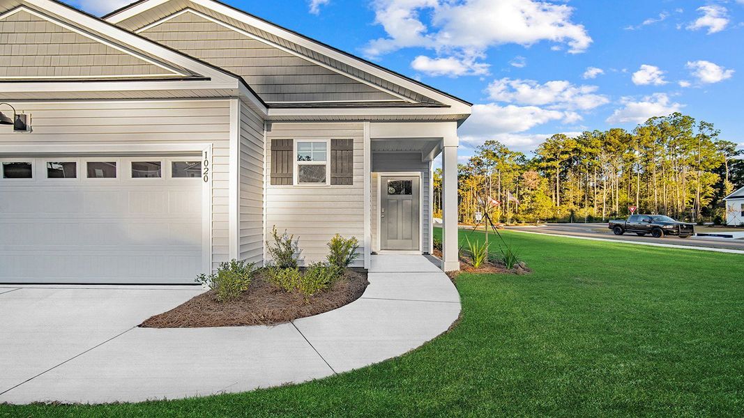 Exterior details and patio area of a home in The Lakes at North Glynn, Brunswick (Image 2).