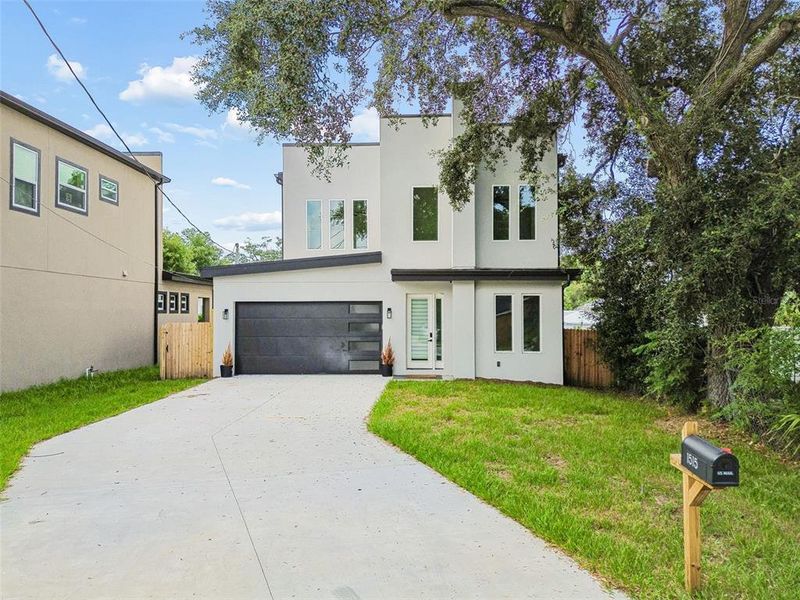 Front exterior of a new home in , Tampa, FL, highlighting curb appeal (Image 31).