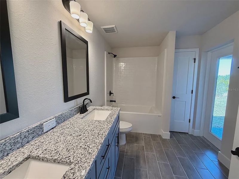 Furnished interior view inside a new home in South Gulf Cove, Port Charlotte (Image 10).
