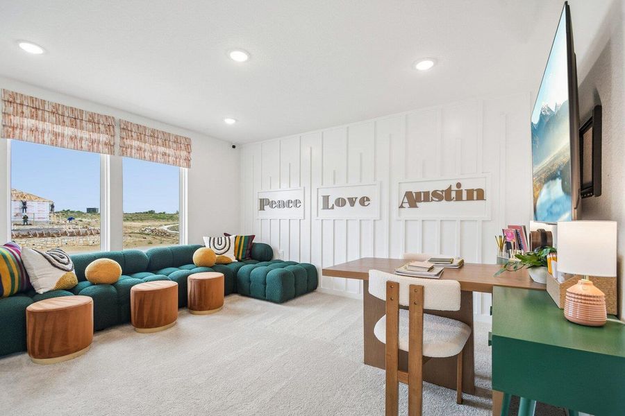 Recessed lighting and soft carpeting elevate this versatile office and living space. Recessed lighting and soft carpeting elevate this versatile office and living space.